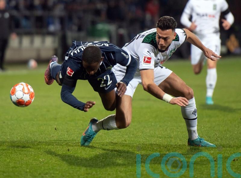 Bochum and Borussia Monchengladbach abandoned after official struck by object