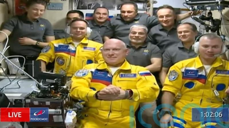 Russian cosmonauts wear Ukraine colours to International Space Station