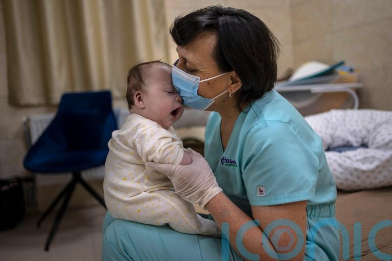 Surrogate babies wait out war in makeshift bomb shelter