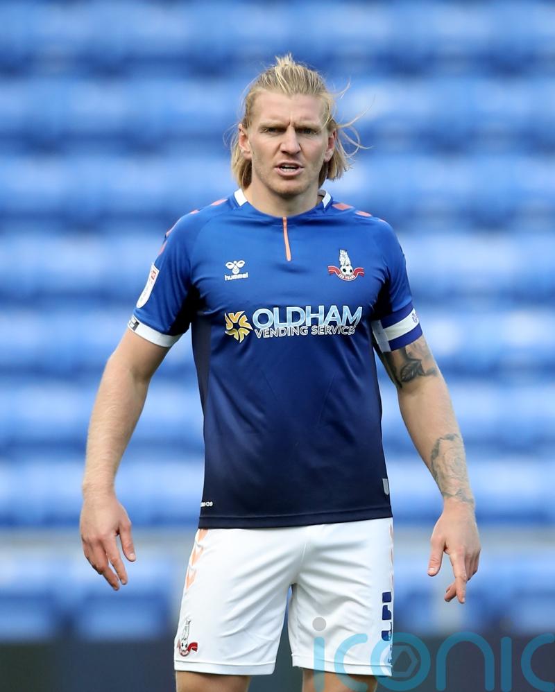 Oldham still without suspended captain Carl Piergianni for Sutton clash