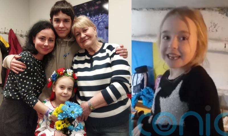 Ukrainian girl who sang Let It Go reunited with mother as she performs in Poland