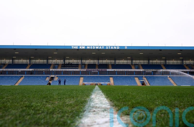 Football ban for fan who pushed player who ran into stand