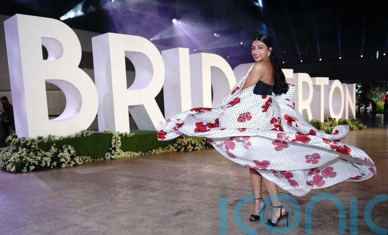 Bridgerton stars swap their corsets for bold looks at series two UK premiere