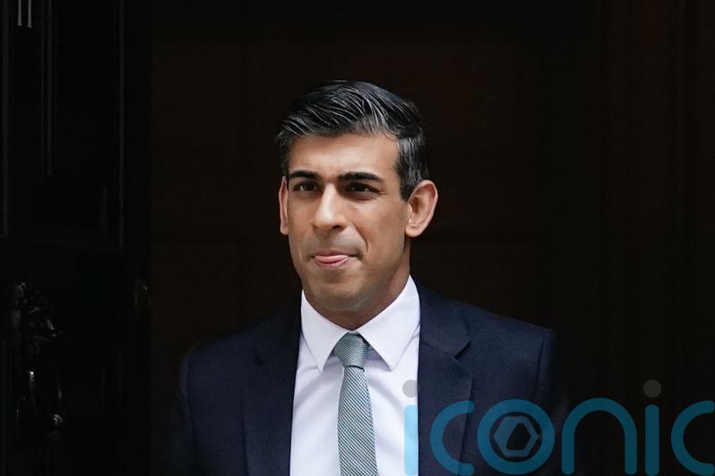 Growth forecast slashed as Sunak promises help to cope with economic uncertainty