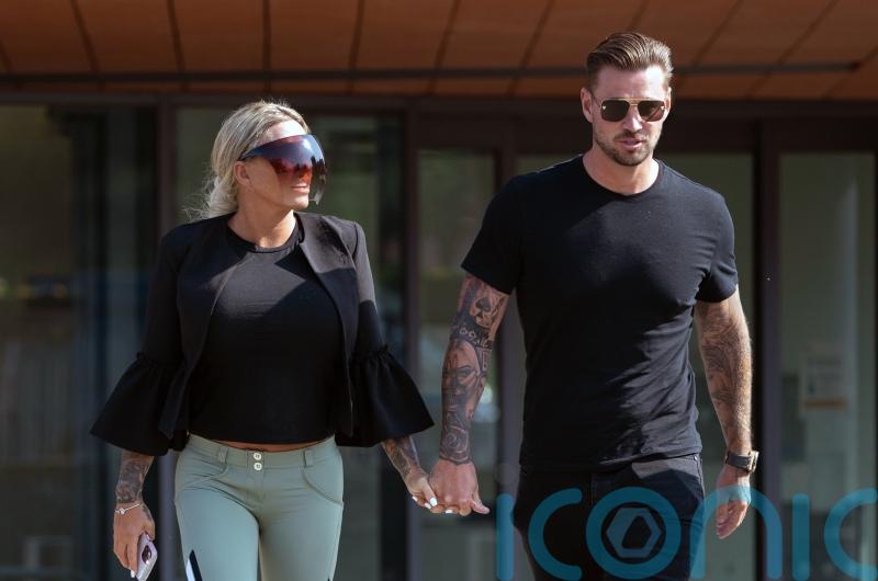 Carl Woods denies using threatening words or behaviour against Katie Price