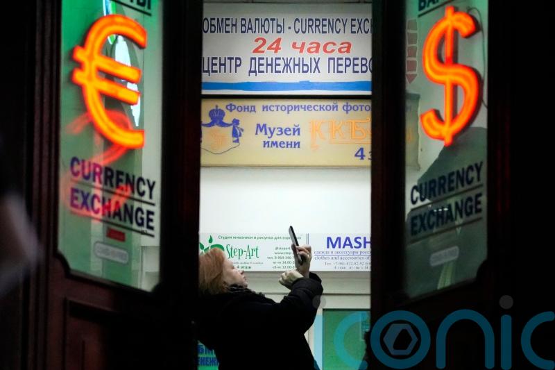 Russian stock market faces heavy restrictions as limited trading resumes