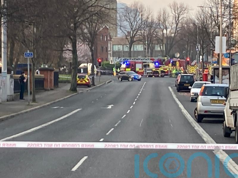 Emergency workers attend scene of collapsed wall in north Belfast