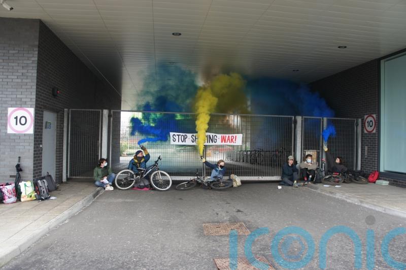 Climate activists blockade shipping company in solidarity with Ukraine