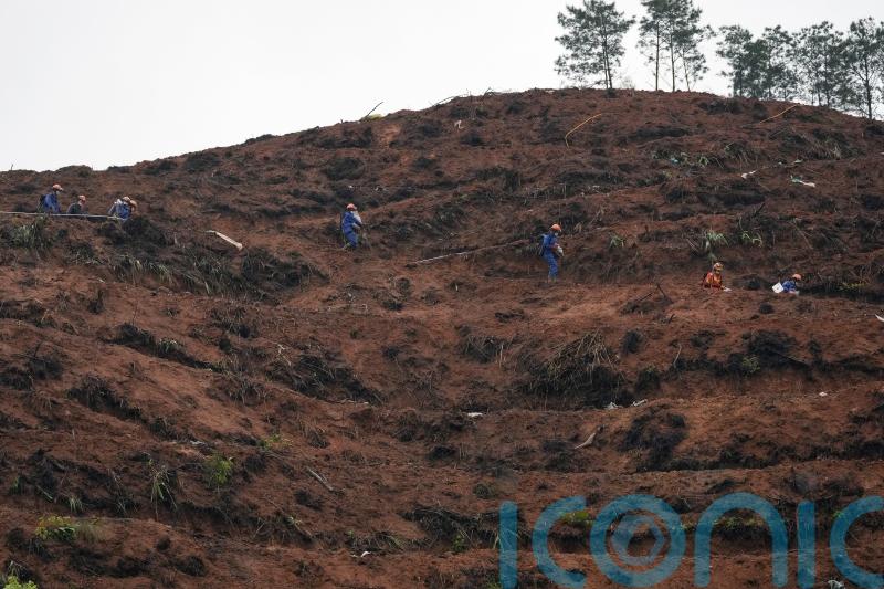 China says no survivors in plane crash with 132 on board