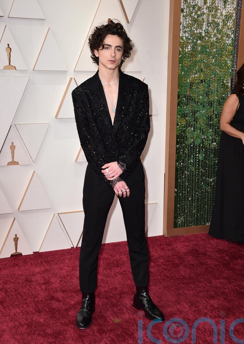 Timothee Chalamet goes shirtless on the Oscars red carpet