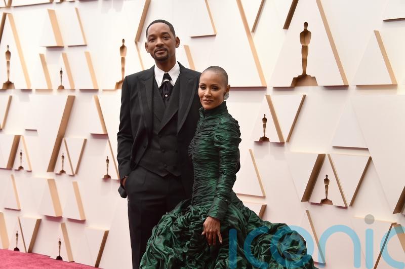 Hollywood power couples arrive hand in hand at the Oscars
