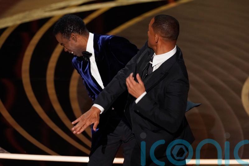 Will Smith appears to hit Chris Rock on Oscars stage after gag about wife Jada