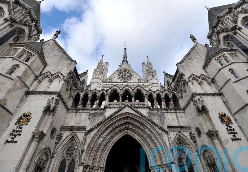 Judge postpones trial after bank sues Ukrainian businessmen