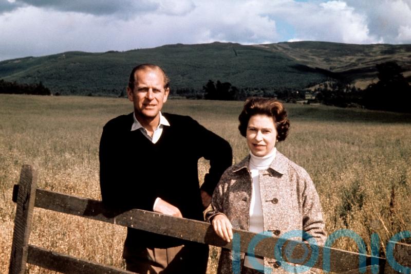 On Philip’s memorial, touching pictures of the prince as a husband and father