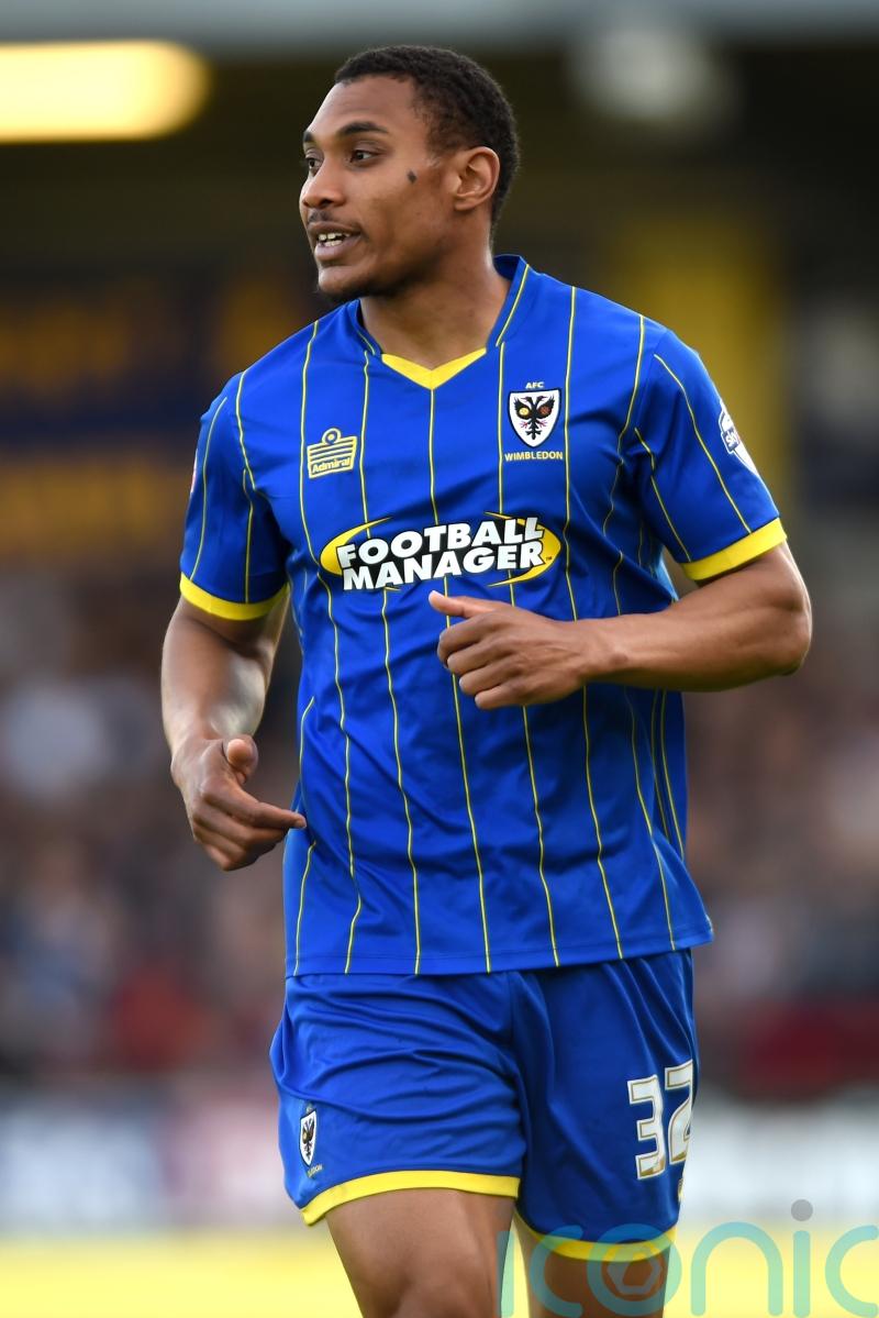 AFC Wimbledon put Darius Charles in caretaker charge after Mark Robinson exit