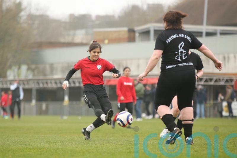 Afghanistan development squad face women MPs in Amnesty International initiative
