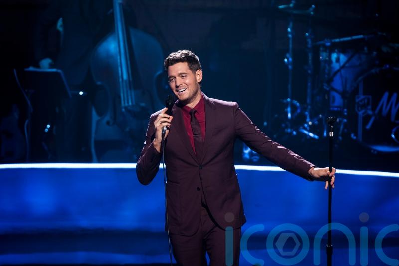 Michael Buble fends off Machine Gun Kelly to deliver chart success