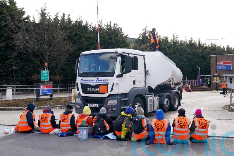 Dozens of climate change protesters arrested after 10 oil terminals blocked