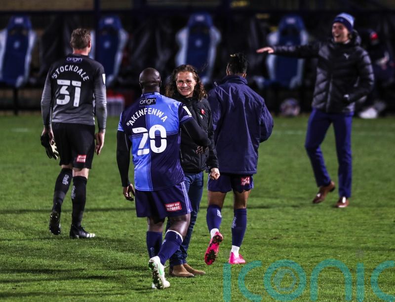 Gareth Ainsworth happy to celebrate Adebayo Akinfenwa in style