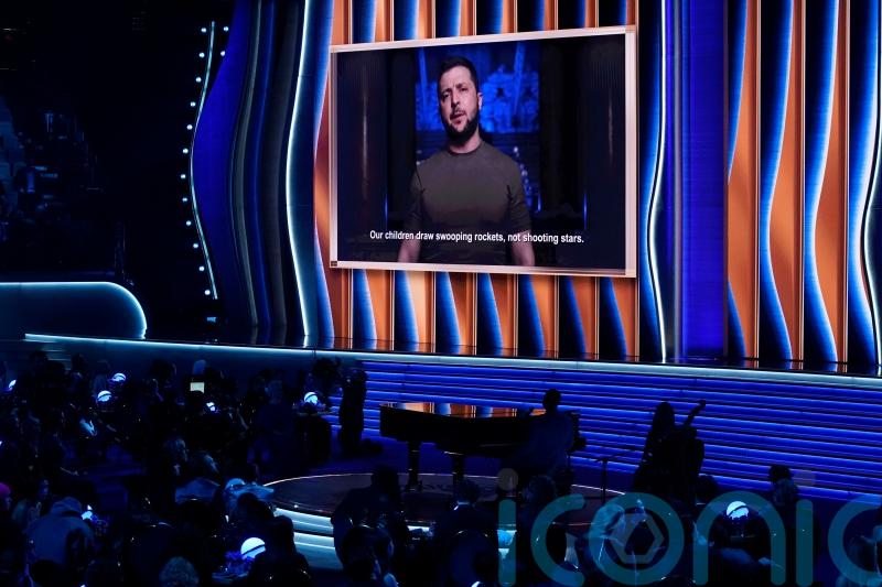 Volodymyr Zelensky pleads for musicians’ support ‘but not silence’ at Grammys
