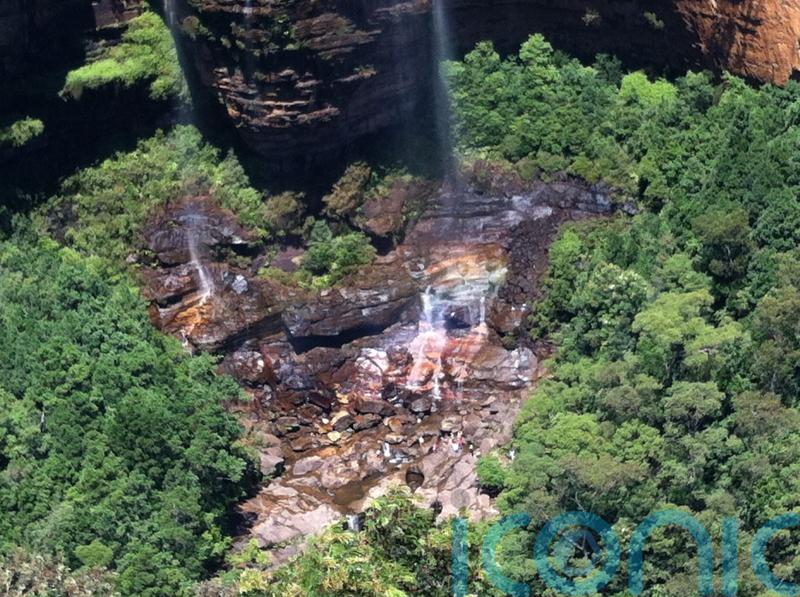 Bodies of British father-and-son tourists recovered after Australia landslide