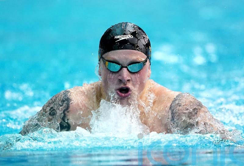Adam Peaty hits form to retain British title