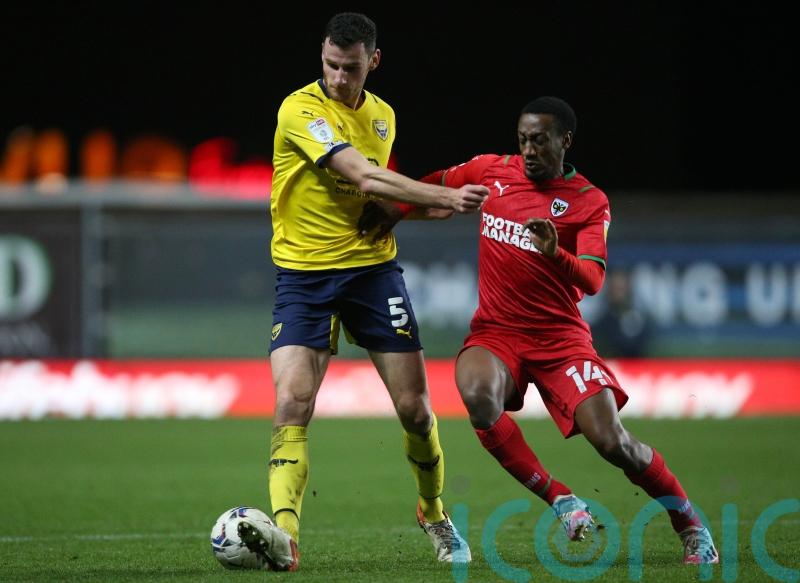 Zach Robinson rescues AFC Wimbledon a point against 10-man Charlton