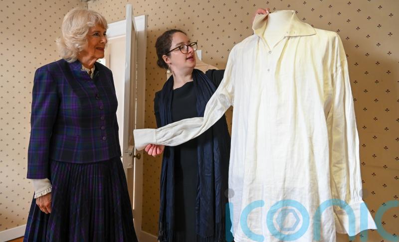 Camilla tours Jane Austen’s home and sees Mr Darcy’s famous white shirt