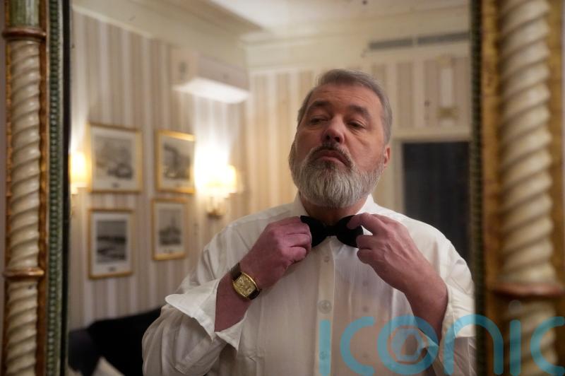Russian Nobel-winning editor says he was attacked on train