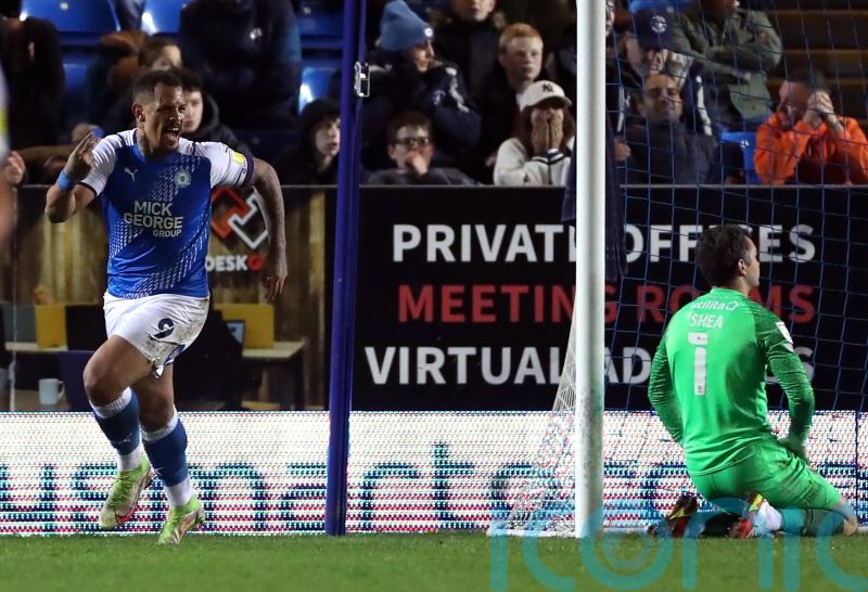 Jonson Clarke-Harris equaliser sees 10-man Peterborough earn Bristol City point