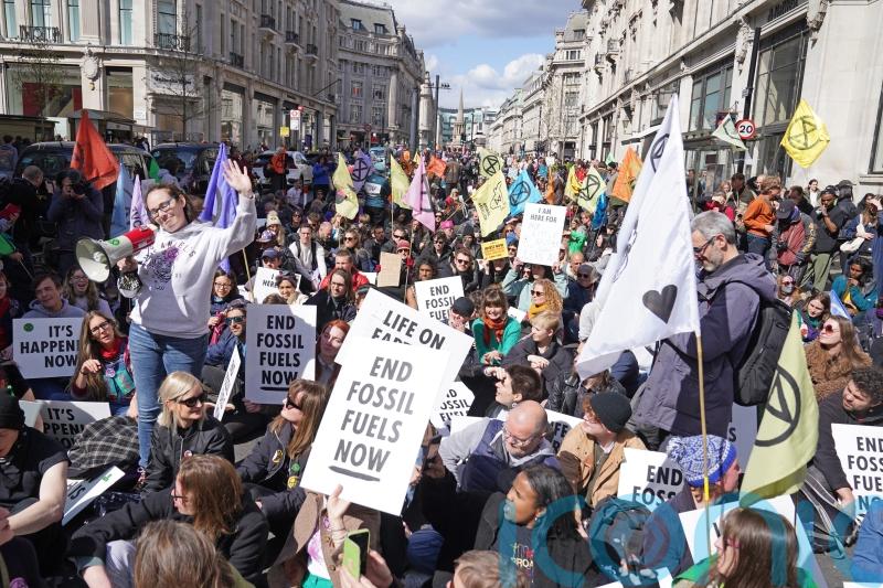Extinction Rebellion stages sit-down protest in central London