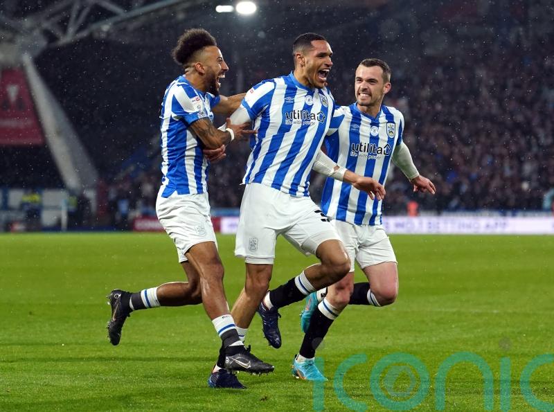 Huddersfield beat fellow promotion hopefuls Luton to move up to third