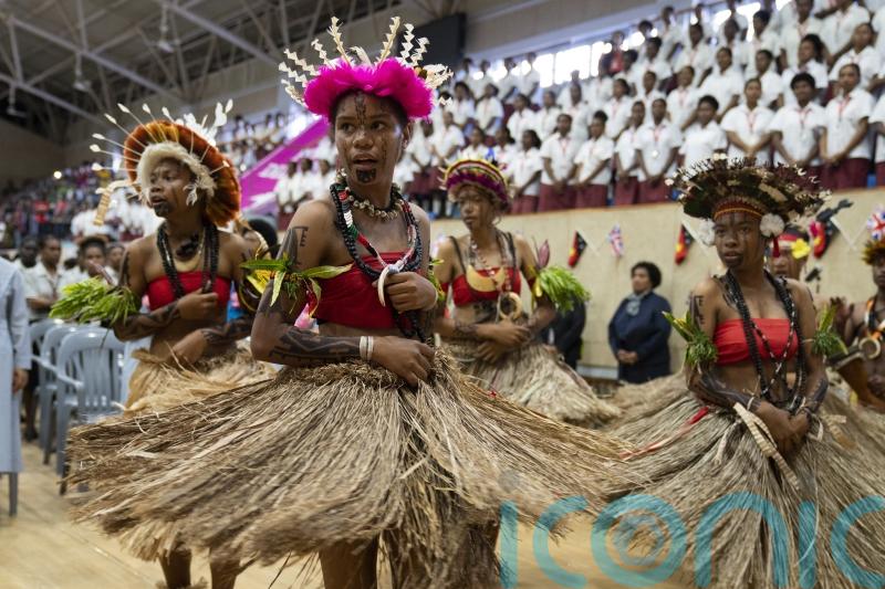 Anne greeted by traditional performances at Papua New Guinea school