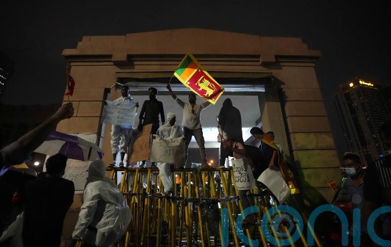Sri Lanka halts debt repayment pending IMF bailout plan