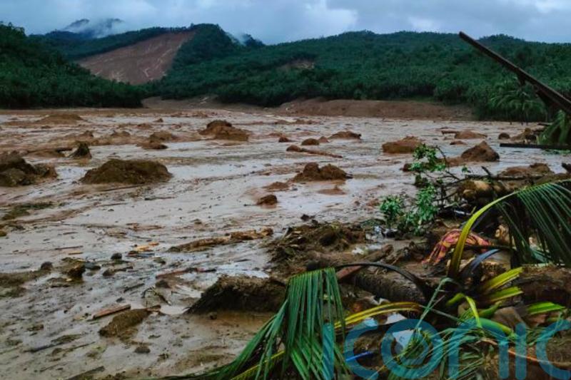 Rescuers look for missing people after deadly landslides in Philippines