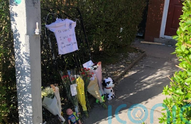 Tributes left at scene of house fire in Lancashire after two children die