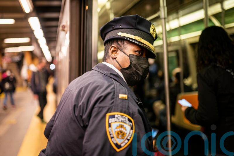 New York police hunt gunman after subway shooting