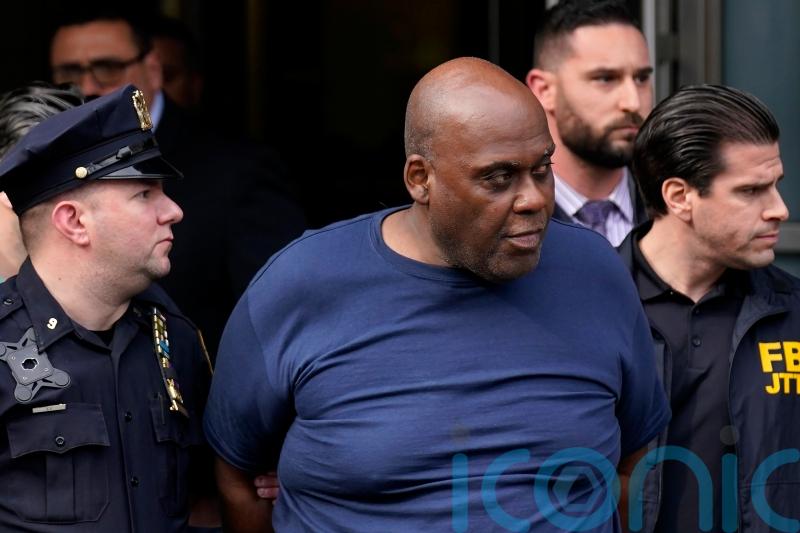 Police search for motive over New York subway shooting