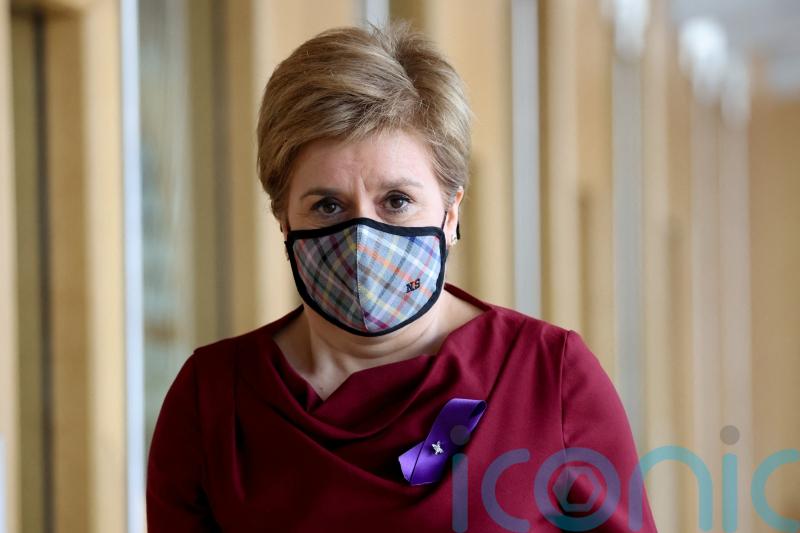 First Minister confident most Scots will continue with masks after easing