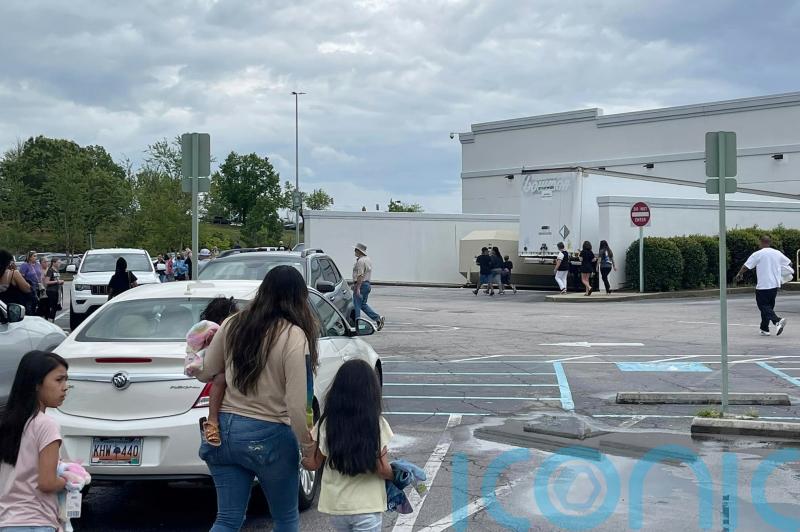 Three held after 12 injured in shooting at South Carolina mall