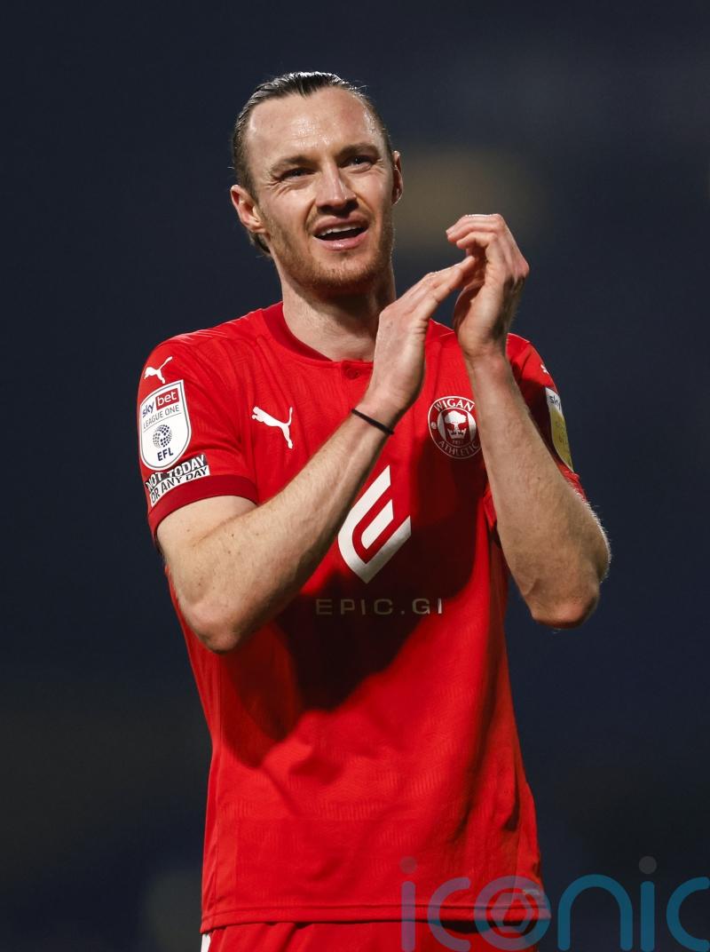 Will Keane’s brace earns Wigan a point and maintains their promotion charge