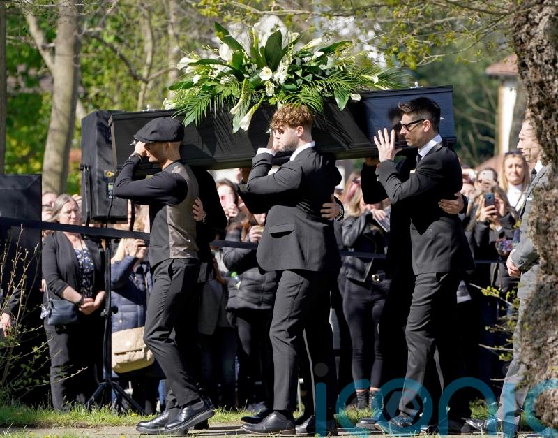 Tom Parker’s bandmates from The Wanted carry his coffin as funeral begins