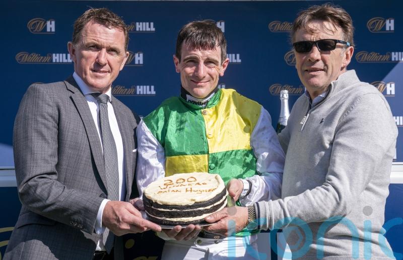Hughes delighted to celebrate double century with McCoy and Scudamore