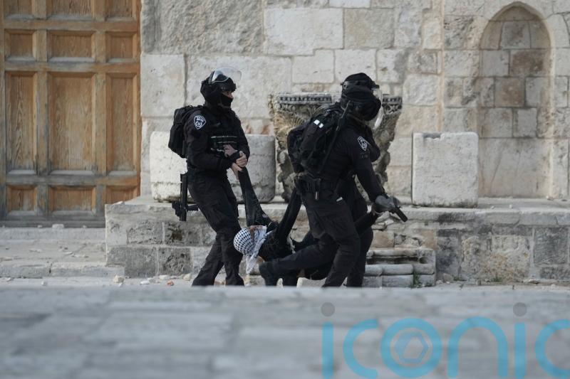Israeli police storm Jerusalem holy site after rock-throwing