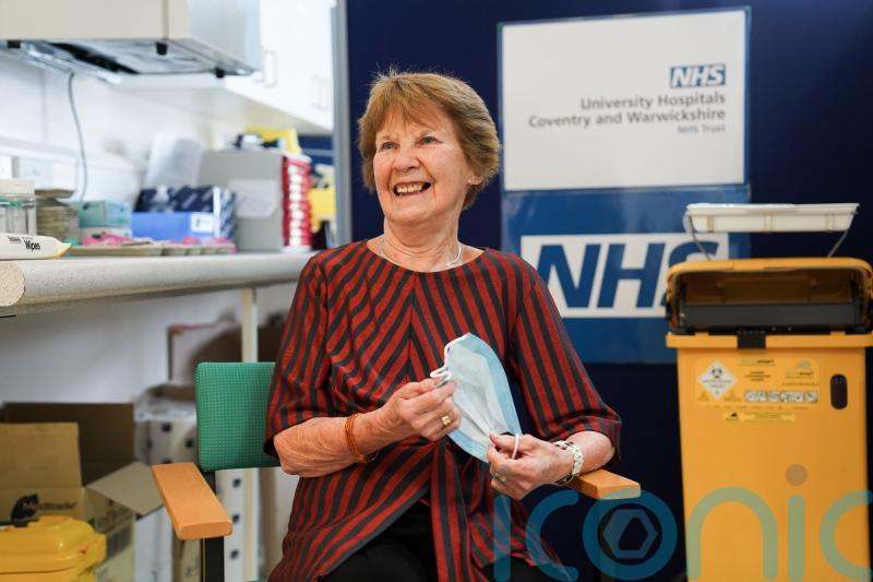 First patient to receive Covid-19 vaccine returns to hospital for spring booster