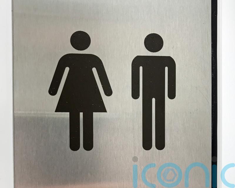 Woman rescued after falling into toilet trying to retrieve phone