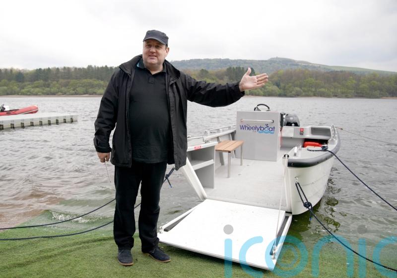 Peter Kay launches wheelchair-accessible boat on Lancashire reservoir
