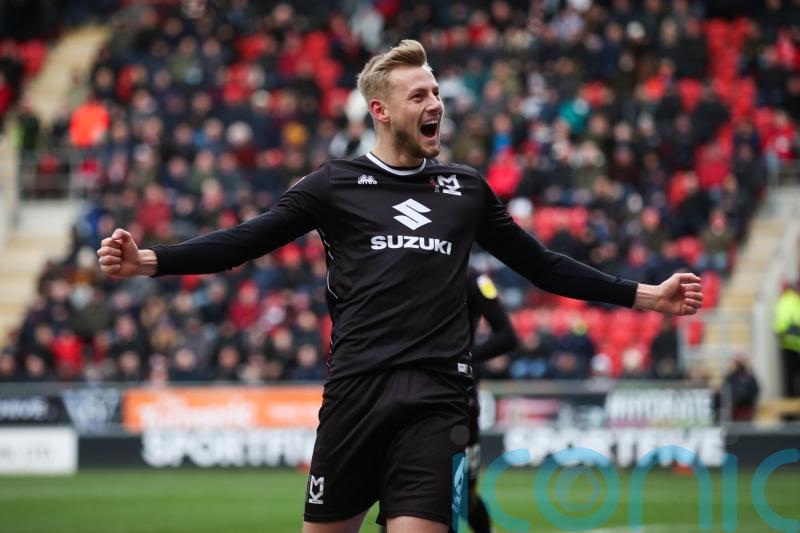 MK Dons keep pressure on Rotherham with win over Morecambe