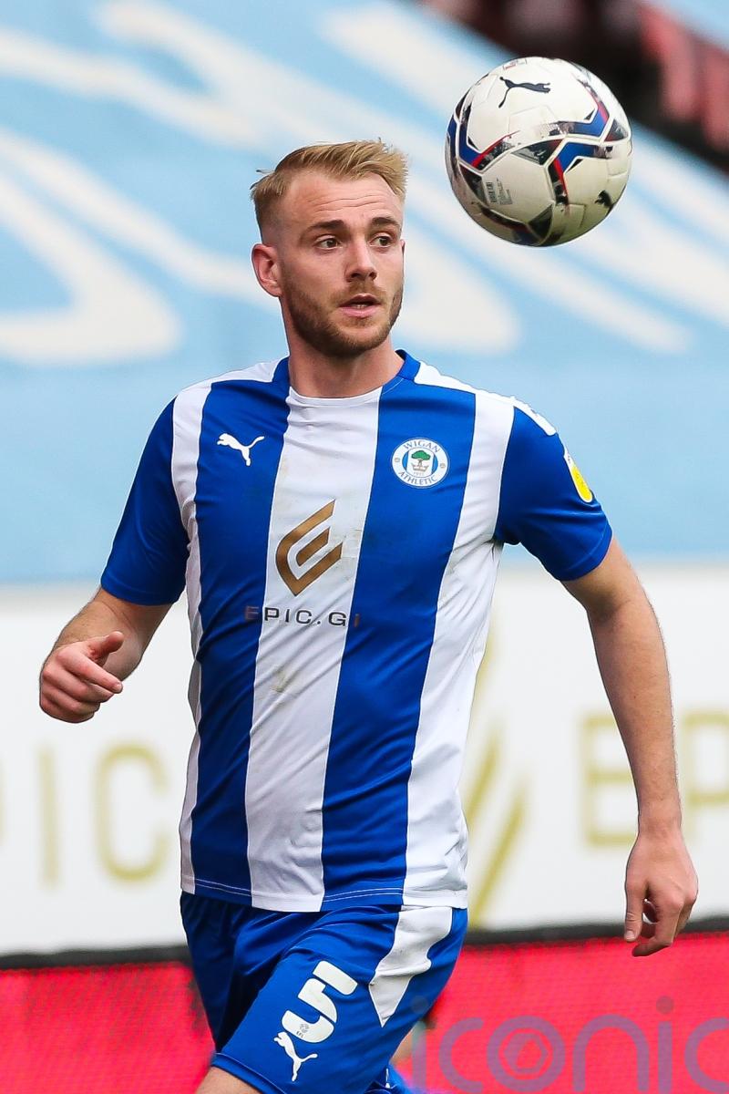 Leaders Wigan made to wait for promotion after being held by Plymouth