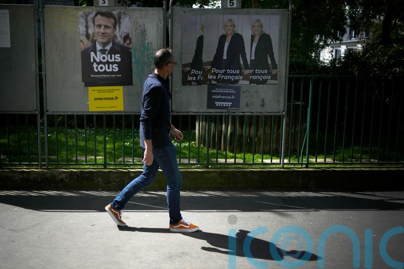 Voting opens in France run-off between Macron and Le Pen
